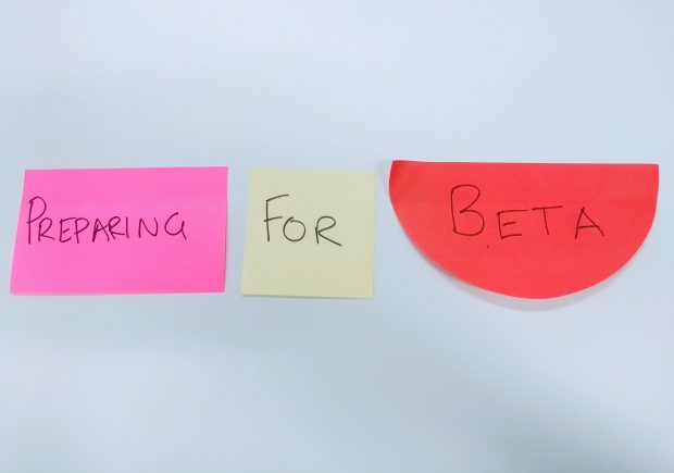 Sticky notes laid out to show the words 'Preparing For Beta'
